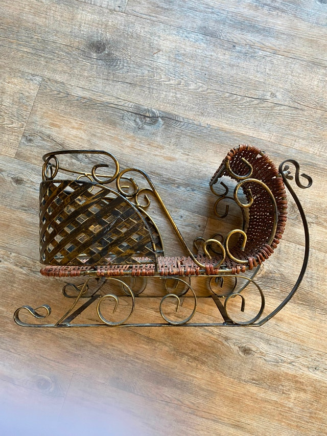 Wrought iron and wicker sleigh