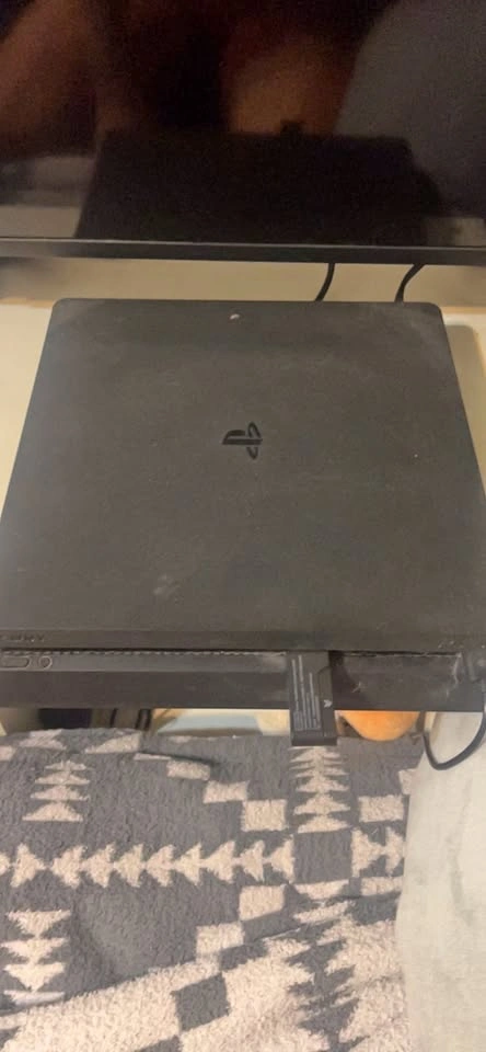 PlayStation 4 Console with 2 Controllers and Charging Dock