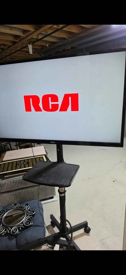 40 inch RCA TV with Mobile Rolling Stand - photo 2