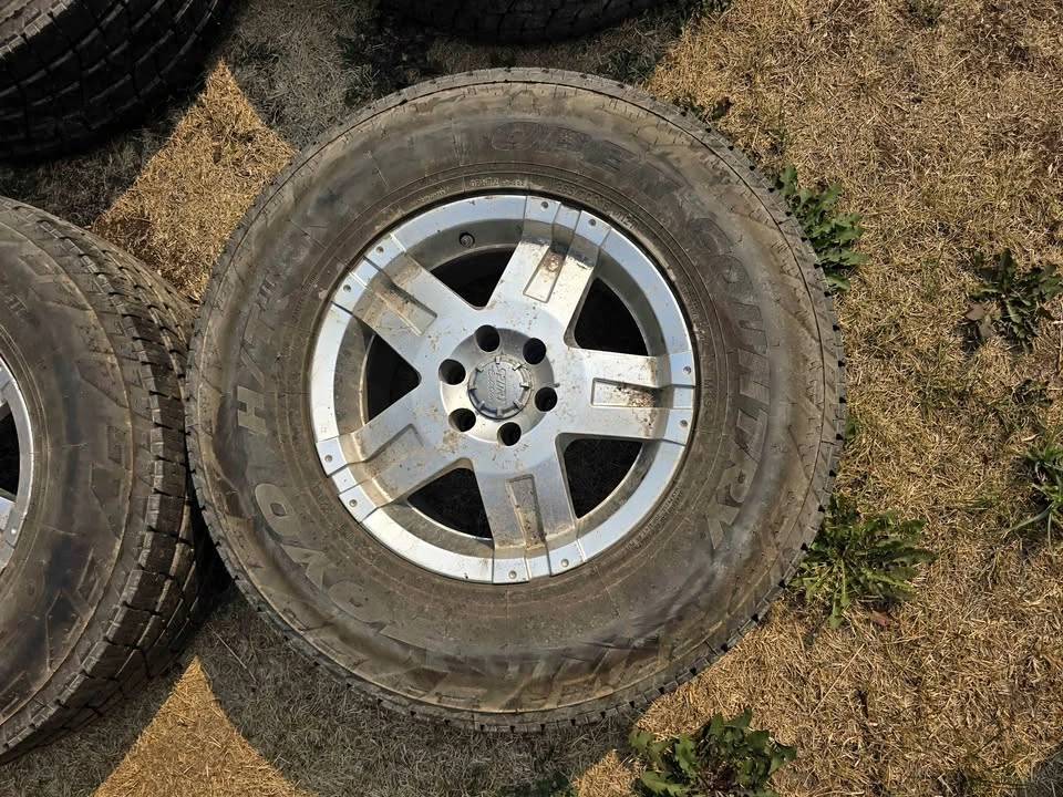 Set of 4 - Toyo Open Country H/T II Tires & Nissan 16" Rims