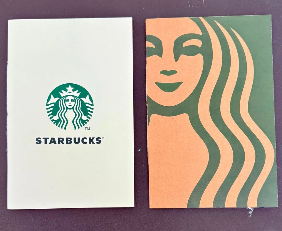 Two original Starbucks softcover notebooks