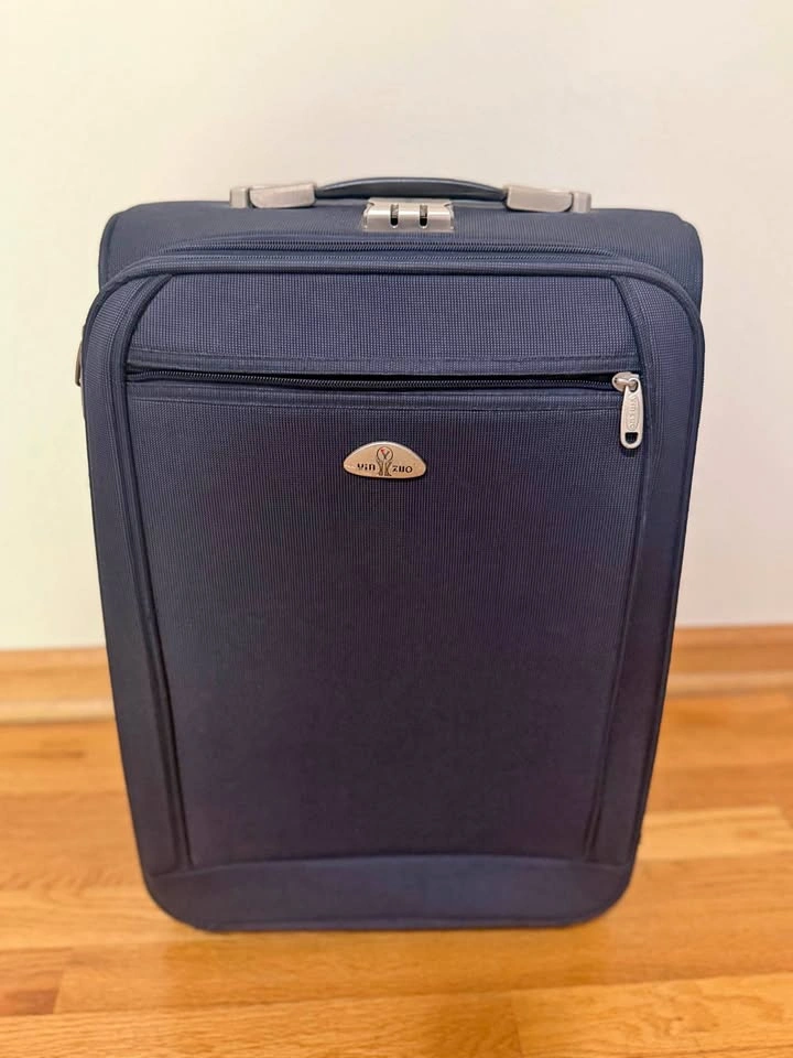 Navy 20.5" Rolling Carry-On - Wheels Roll Smooth