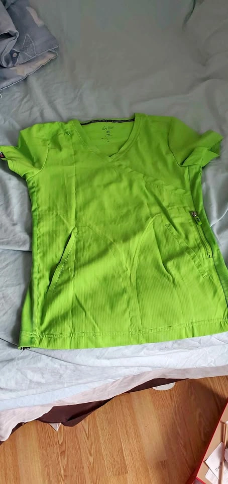 2 XS scrub tops for sale