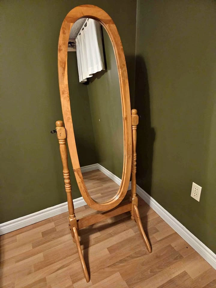 Oval wooden floor mirror