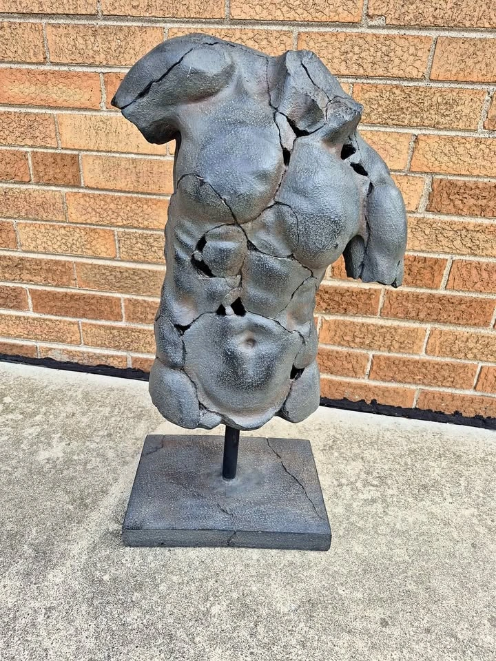 Abstract cracked male torso on stand (Skokie)
