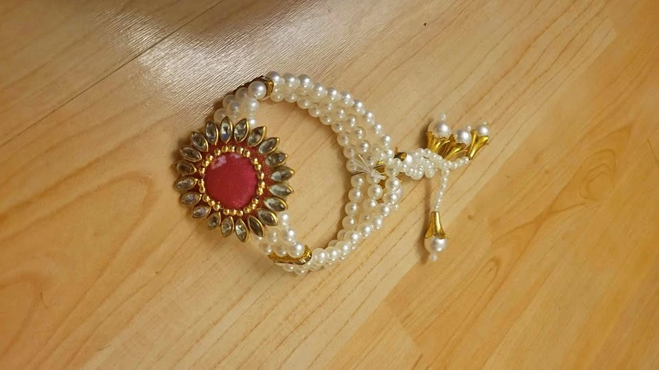 Pearl Multi-Strand Bracelet with Pink Floral Centerpiece