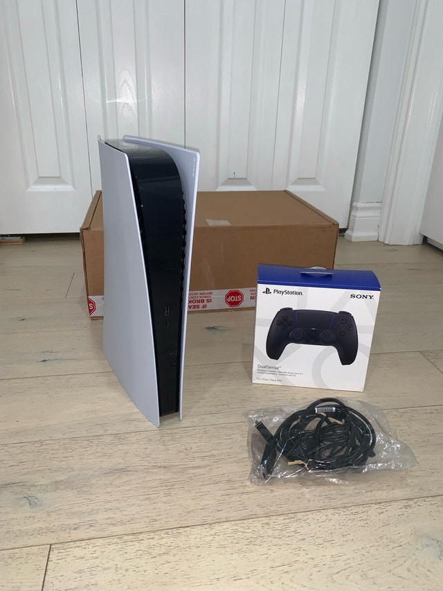 PS5 Digital Edition Like New +Warranty