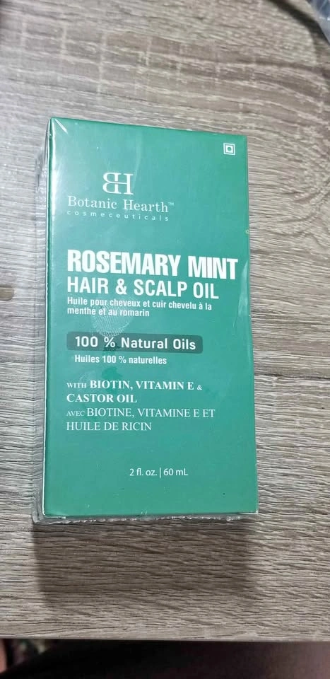 New sealed 60ml rosemary mint hair oil