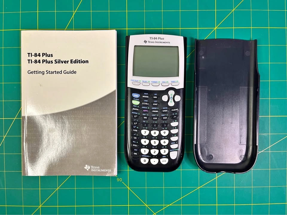 Texas Instruments TI-84 Plus Graphing Calculator w/ Cover & Guid