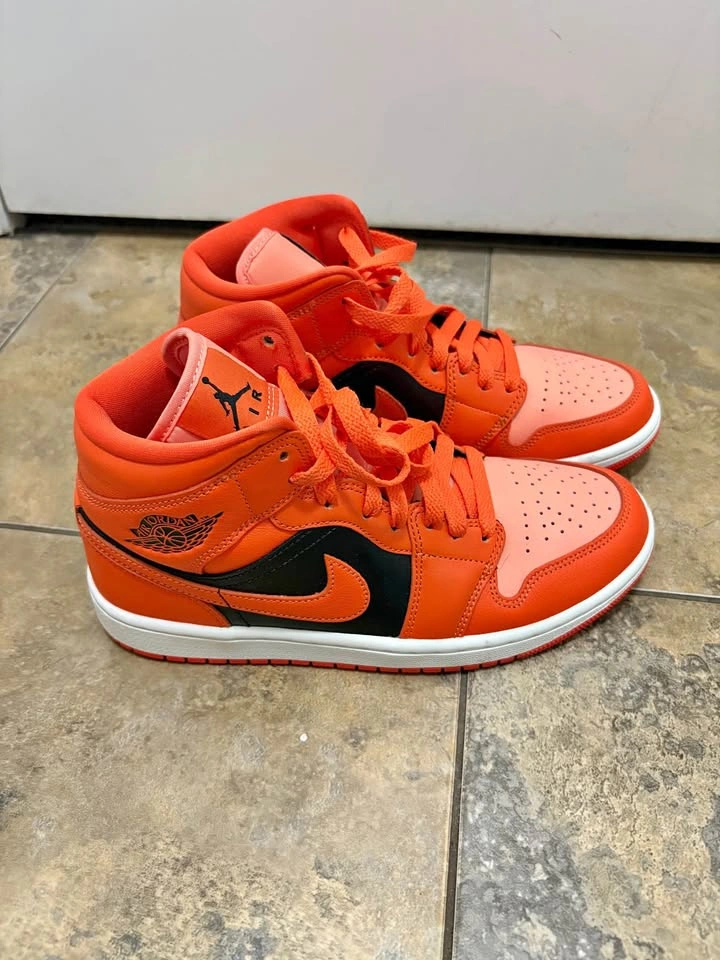 Women’s Orange Air Jordan’s size 8