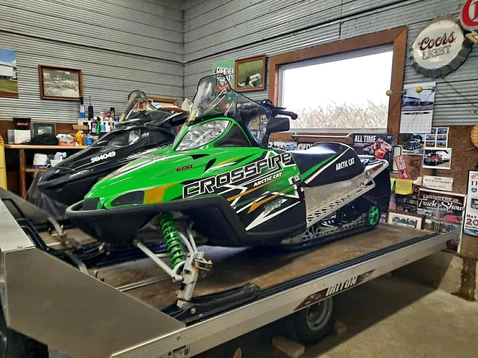 2010 Arctic Cat/Triton snowmobiles/trailer