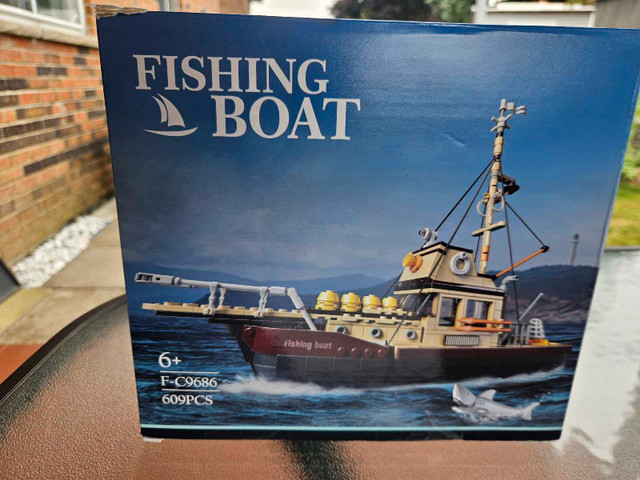 Brand new Fishing Boat Lego, closed box, moving sale