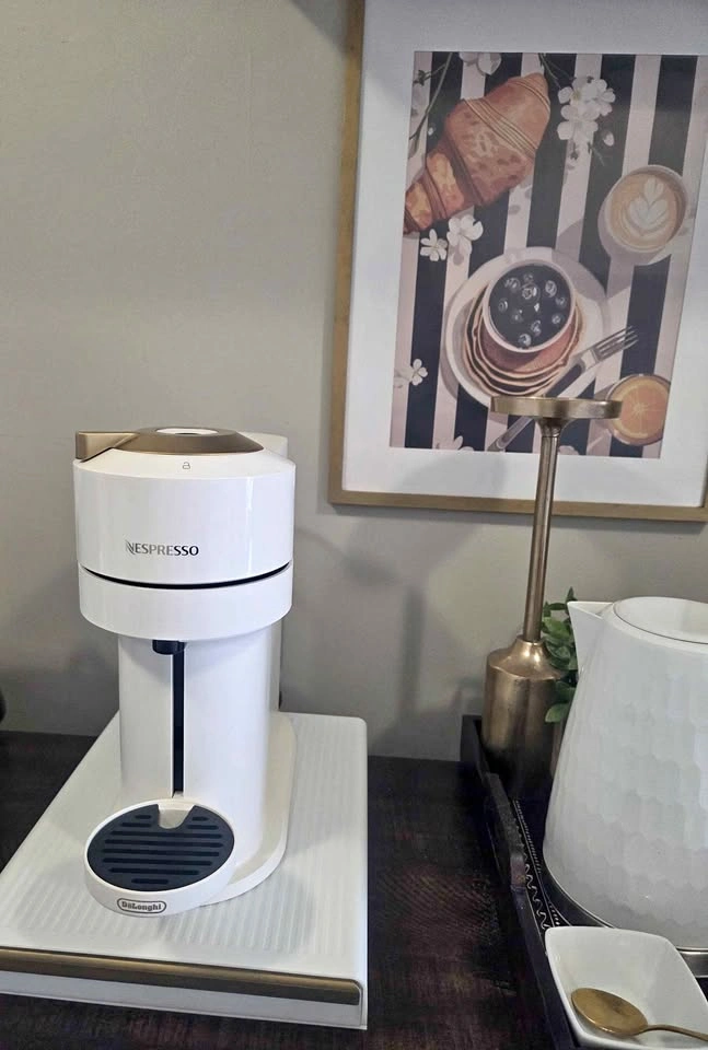 White and Gold Nespresso Coffee Machine and Pod Tray