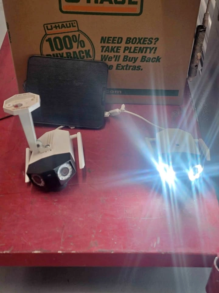 Reolink security cameras x 2 one with base one with out
