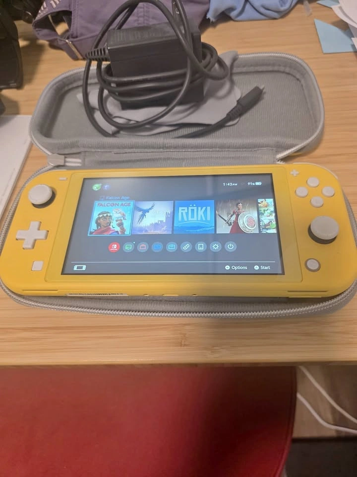 Nintendo Switch Lite (Yellow) — Like New, 128GB microSD + Hard C