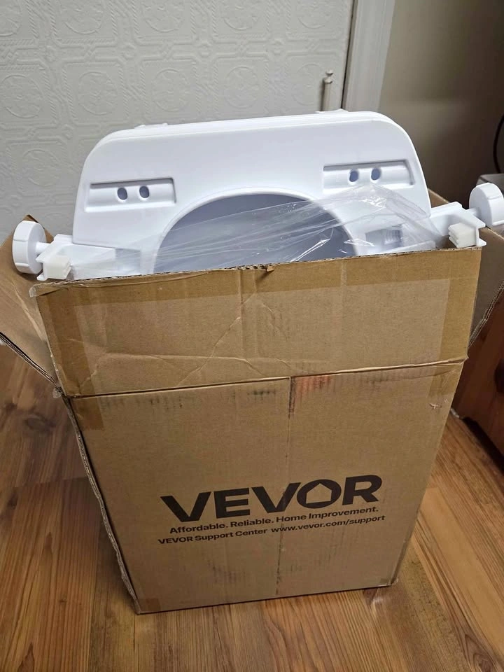 Raised toilet seat with handles