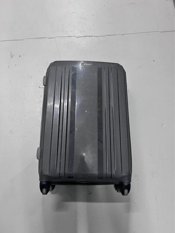 Grey expandable medium checked luggage