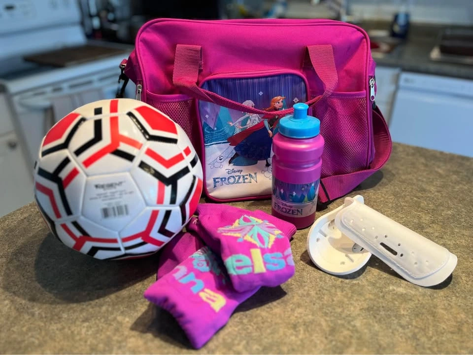 Girl’s Frozen Soccer bag, water bottle, shin guards, socks and s