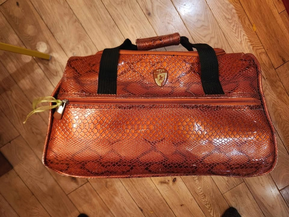 Heys Snakeskin-embossed orange travel bag - photo 2