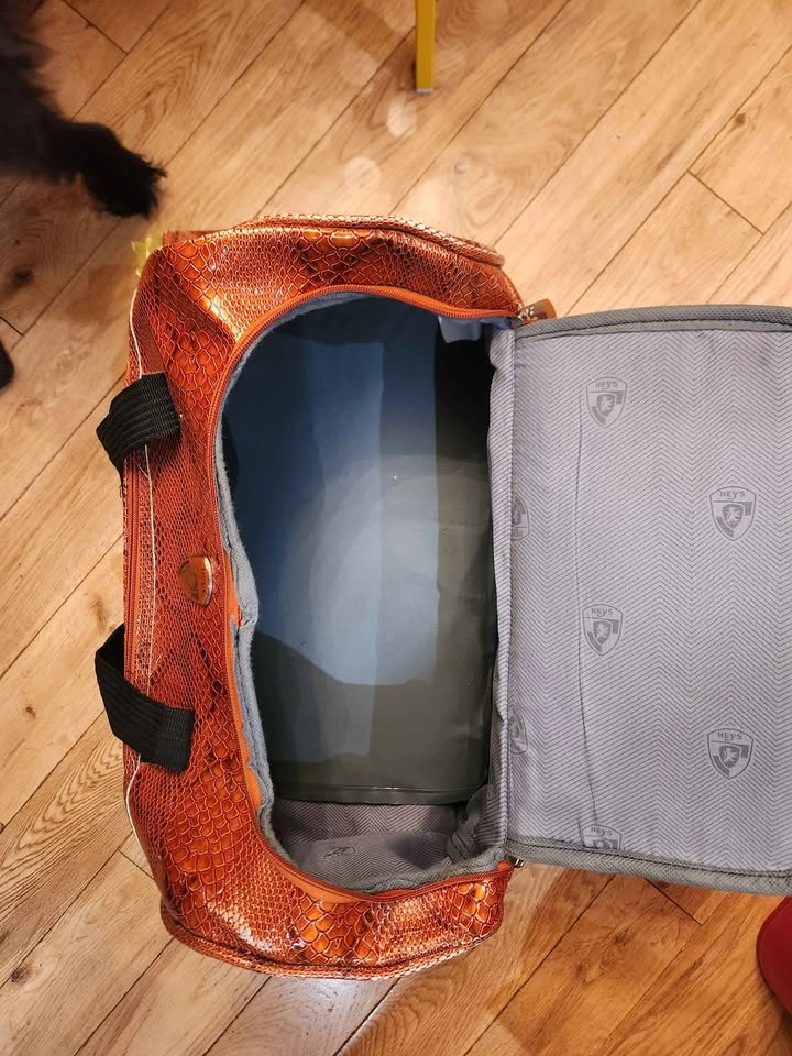 Heys Snakeskin-embossed orange travel bag - photo 5