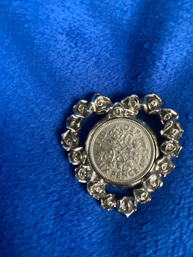 1953 six pence coin and holder