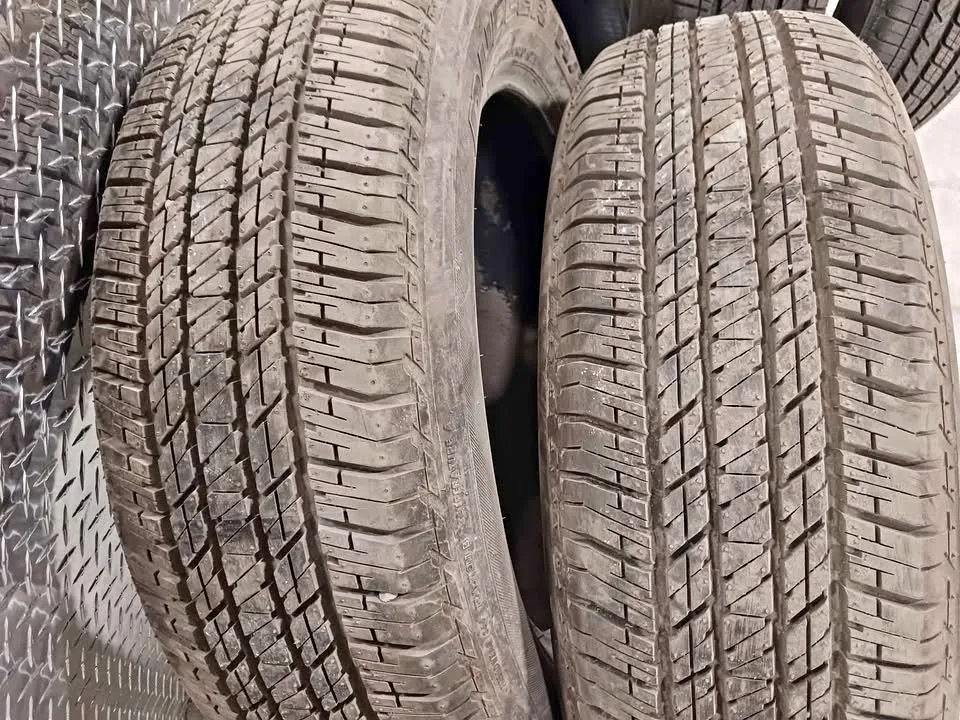 245 60 r20 TWO NEW BRIDGESTONE DUELER H/T ALL SEASON TIRES thumbnail