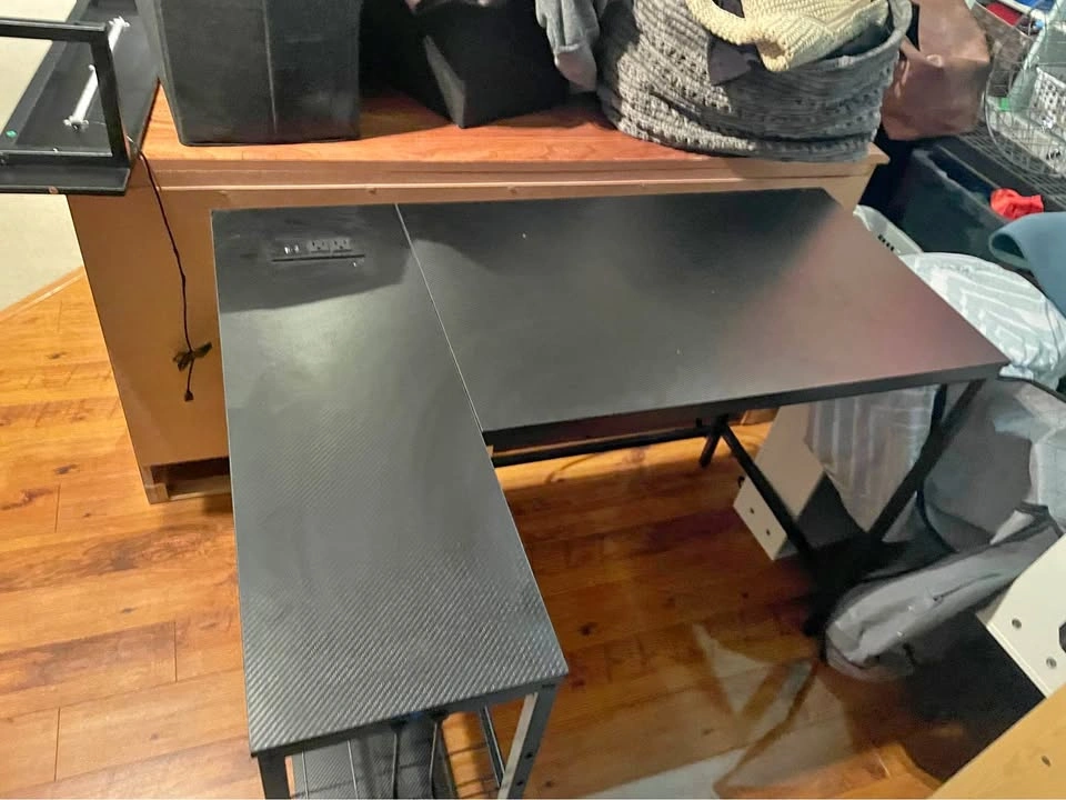 Black L-Shaped Carbon Fiber Desk with Power Outlet