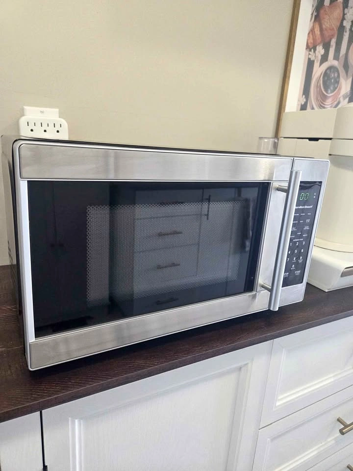 Black and stainless steel microwave