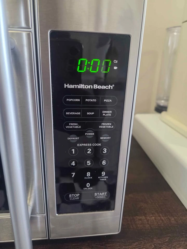 Black and stainless steel microwave - photo 3