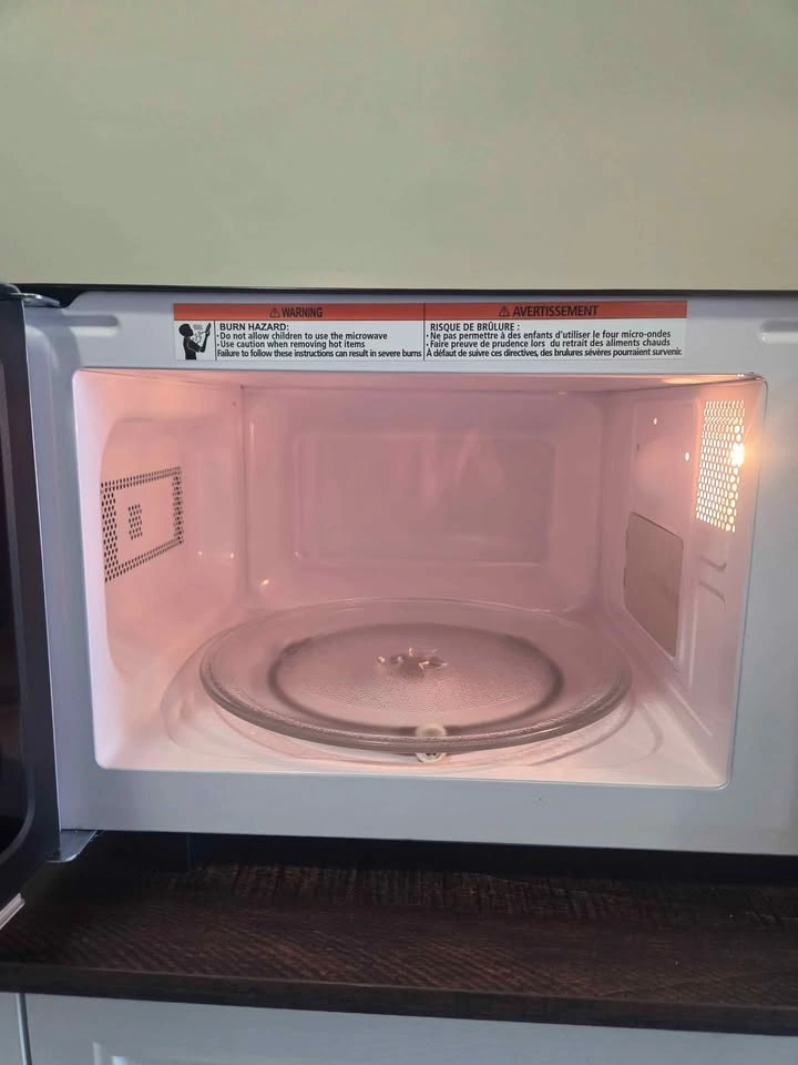 Black and stainless steel microwave - photo 5