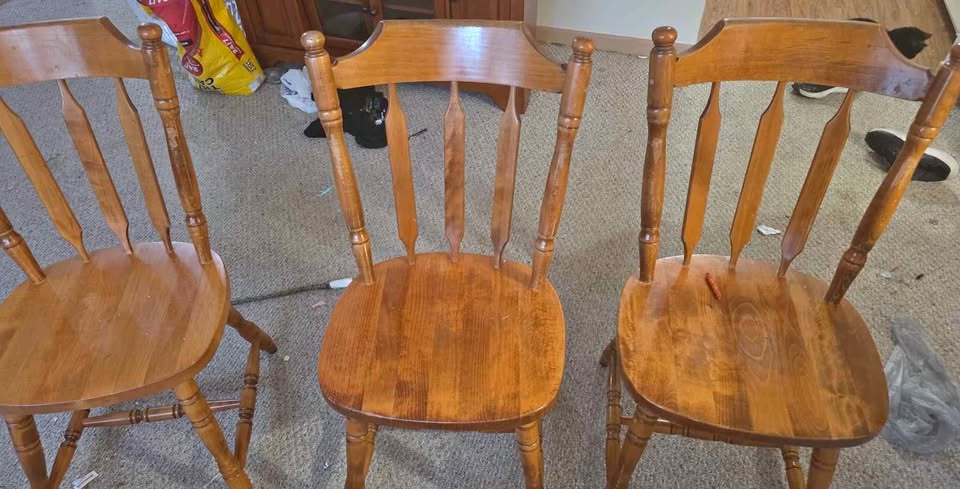 Three wooden chairs