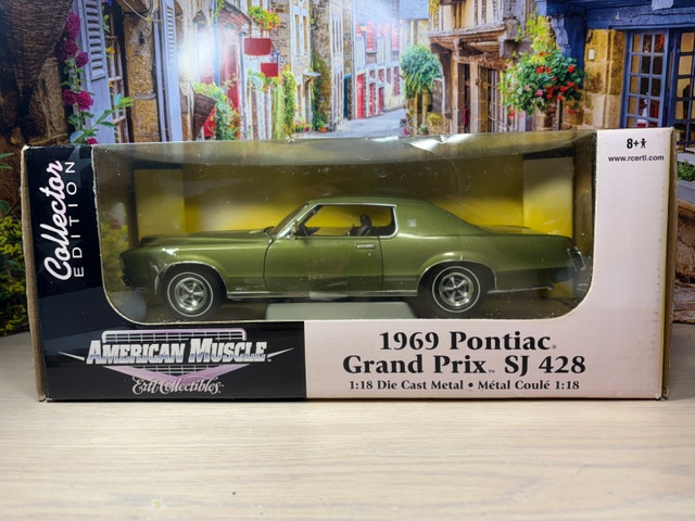 1:18 ERTL 1969 Pontiac Grand Prix SJ 428 Diecast - photo 2
