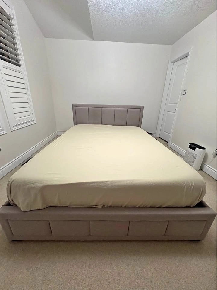 Moving sale: Beige bed with storage space