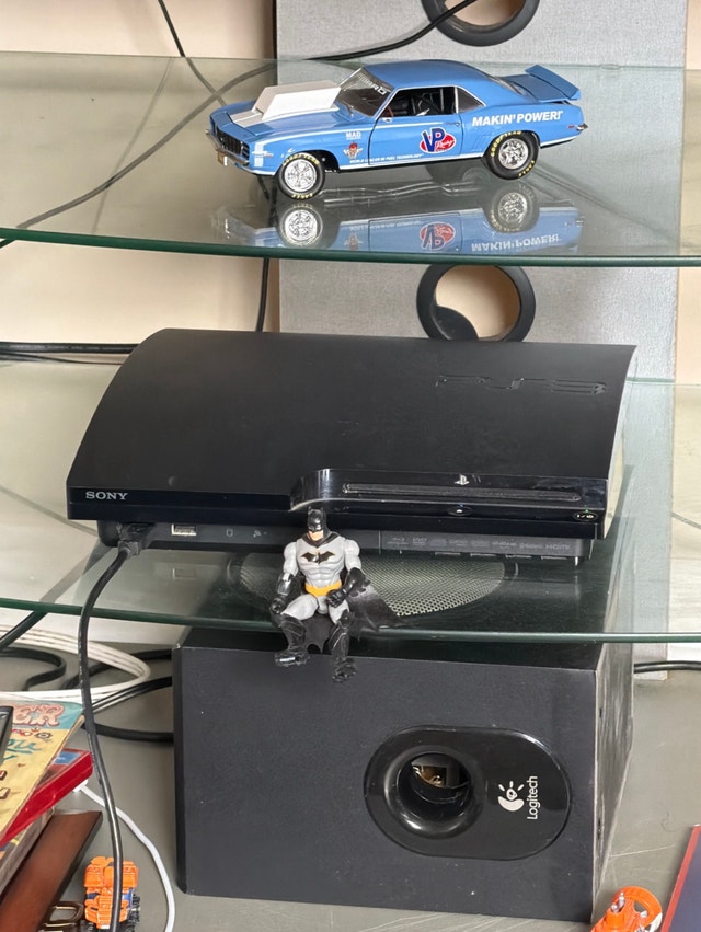 PlayStation 3 Slim - photo 3