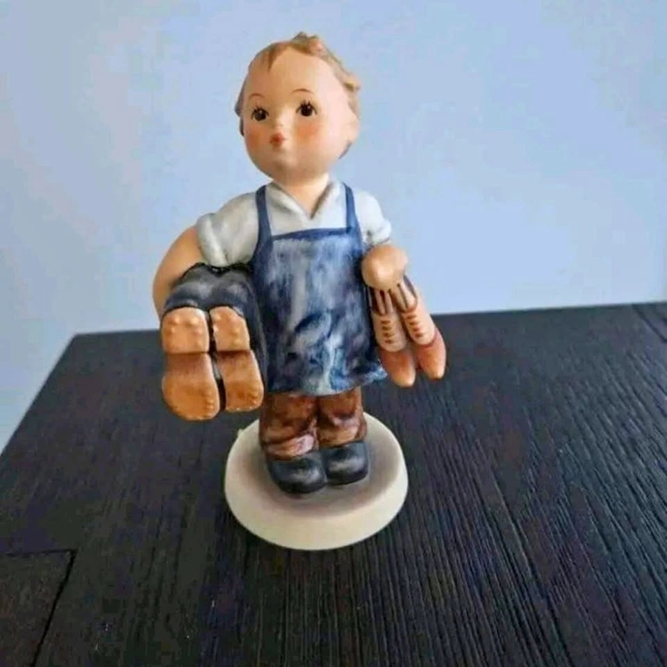 Goebel Figurine with Blue and White Details