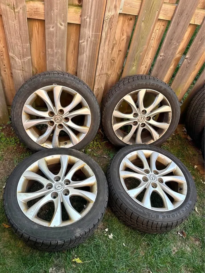 Set of OEM 17” Mazda 3 Rims On Firestone M+S Tires thumbnail
