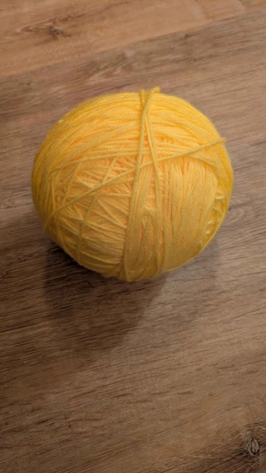 Bright Yellow Yarn Skein