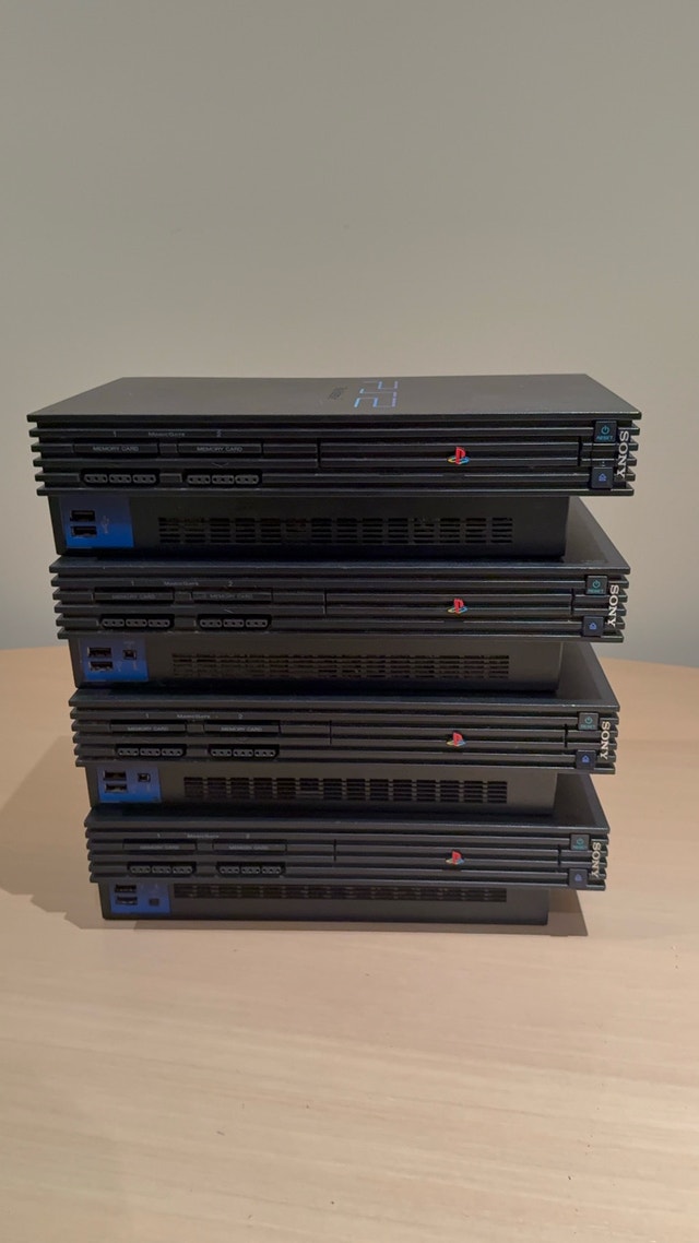 Lot of 4 As-Is Sony PlayStation 2 Consoles