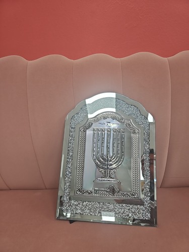 Mirrored Art Piece Featuring a Menorah
