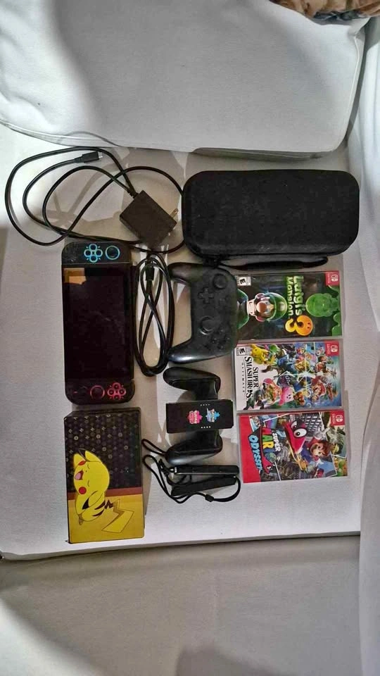 Nintendo Switch Bundle with 3 Games, Pro Controller, and Carryin
