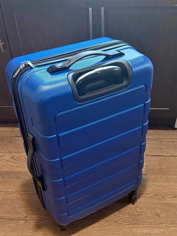 NEW hard-shell suitcases with 4 swivel wheels, 24” medium size