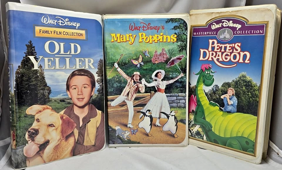Three classic family movies on VHS -- Old Yeller, Mary Poppins,