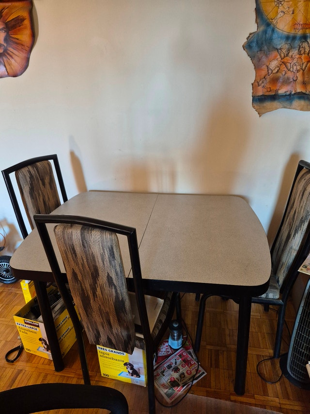 Dining table with 4 chairs. 36" x 48" table with 12" extension.