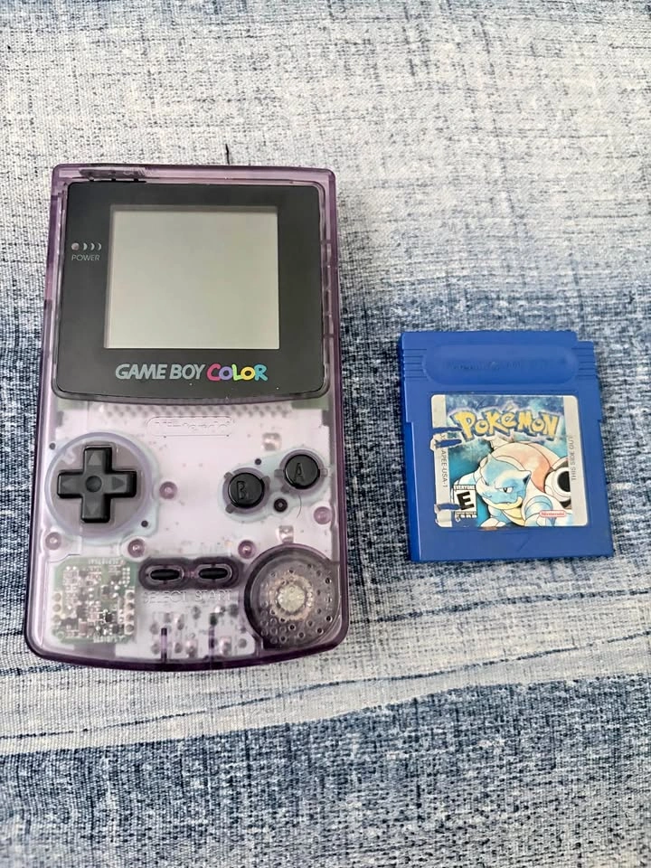 Nintendo Game Boy Color Atomic Purple (1998) and Pokémon Blue Ve