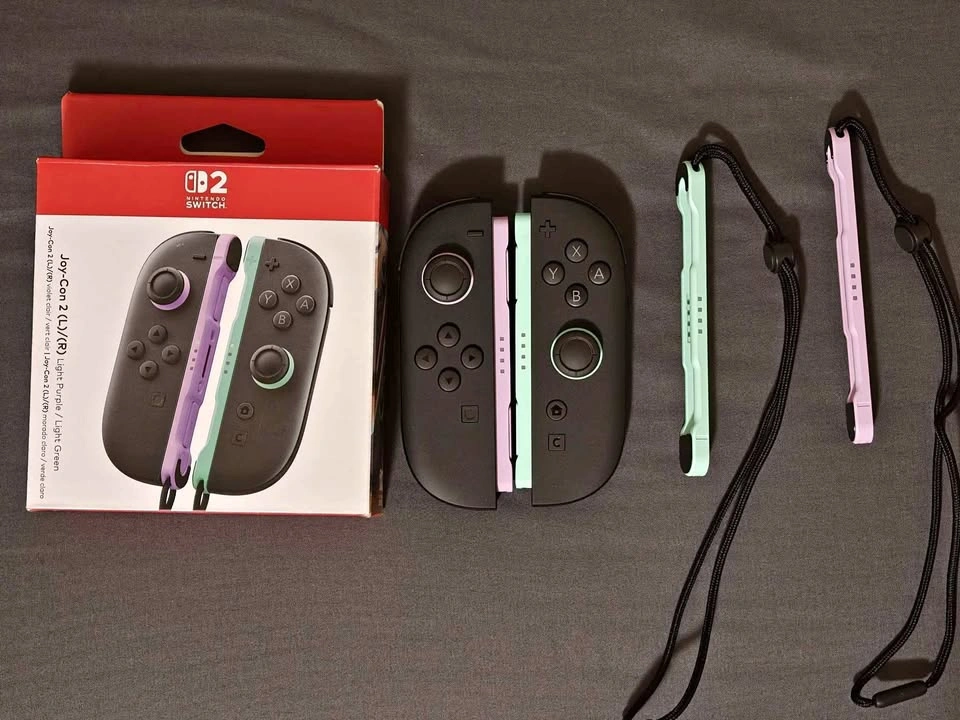 Nintendo Switch Joy-Con Purple and Green - photo 2