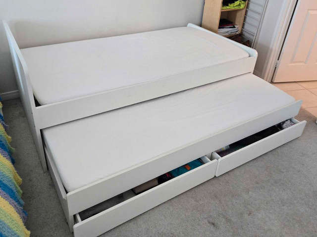 Twin Bed Frame w/ Pullout bed & storage & mattresses (like new) - photo 2
