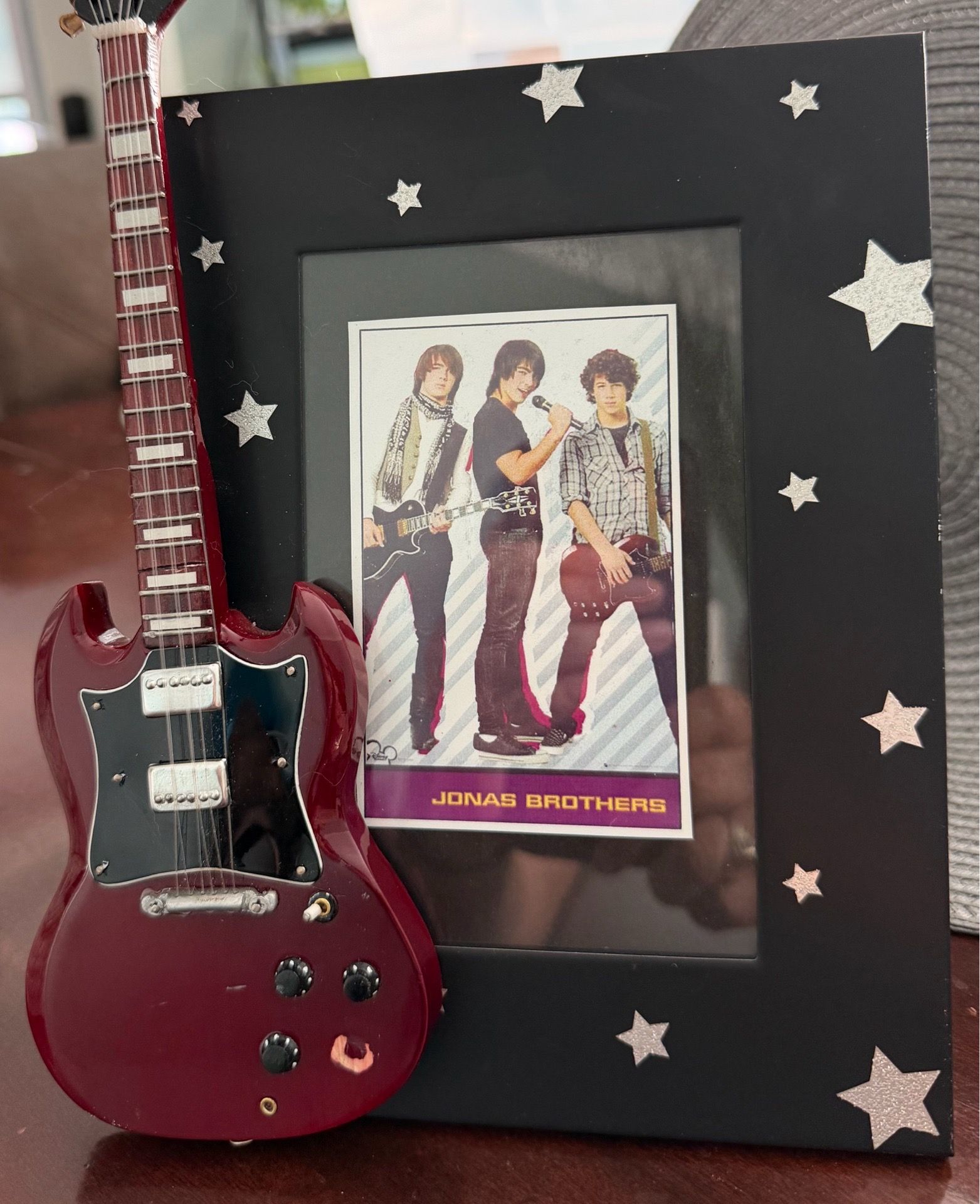 Jonas Brothers picture framed with stars