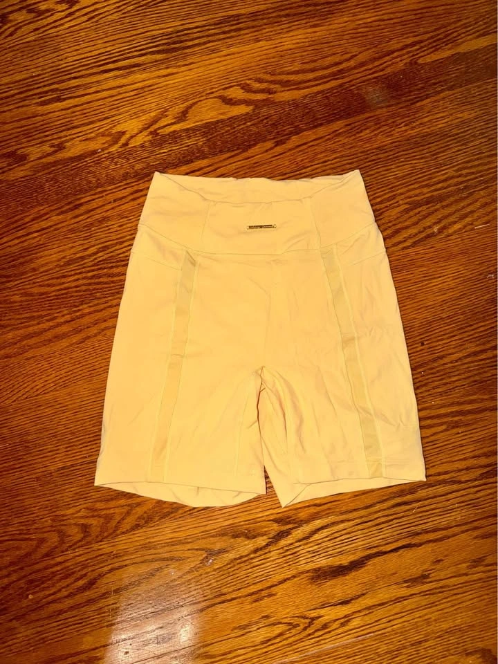 Whitney Simmons Gymshark- Butter yellow shorts