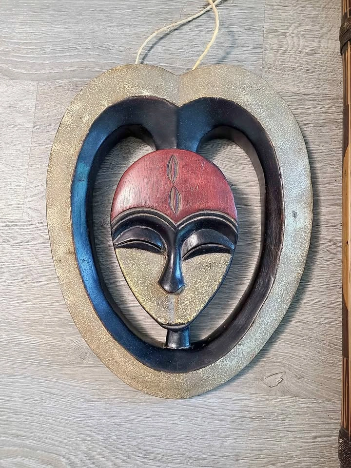 Hand-Carved Wooden Mask and Didgeridoo