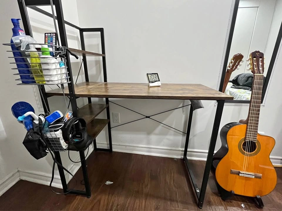 Computer Desk with Shelving and a cushioned chair